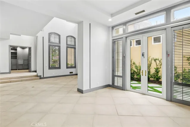 a view of a room with large windows