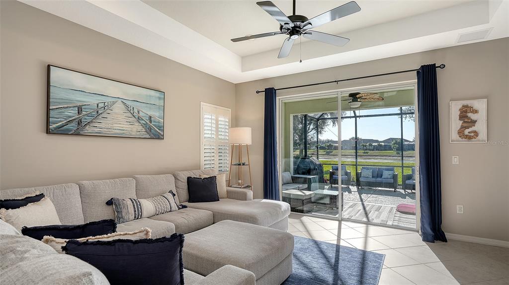 1318 Westover Avenue Parrish, FL 34219 - Photo 11 of 42 a living room with furniture and a large window