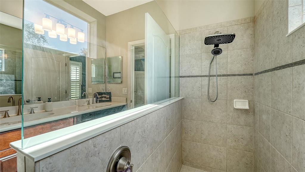 1318 Westover Avenue Parrish, FL 34219 - Photo 17 of 42 a bathroom with a sink and a mirror