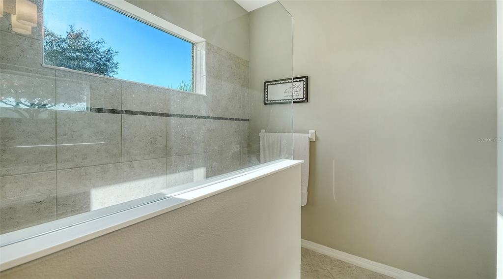 1318 Westover Avenue Parrish, FL 34219 - Photo 18 of 42 a bathroom with a bathtub