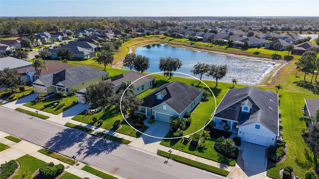 1318 Westover Avenue Parrish, FL 34219 - Photo 2 of 42 an aerial view of residential houses with outdoor space and swimming pool