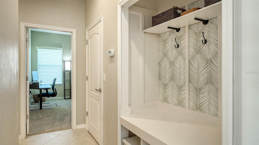 1318 Westover Avenue Parrish, FL 34219 - Photo 24 of 42 a bathroom with a bathtub and a shower