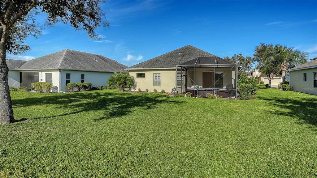1318 Westover Avenue Parrish, FL 34219 - Photo 28 of 42 a front view of a house with a garden