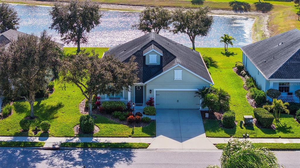 1318 Westover Avenue Parrish, FL 34219 - Photo 3 of 42 a house view with a garden space