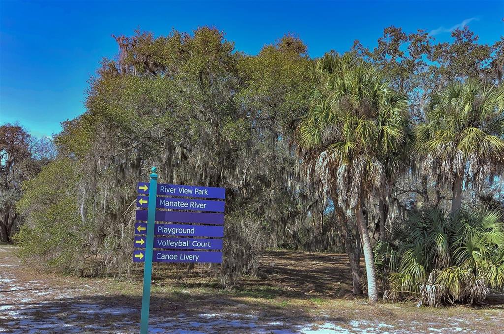 1318 Westover Avenue Parrish, FL 34219 - Photo 35 of 42 a view of a street sign under a large tree