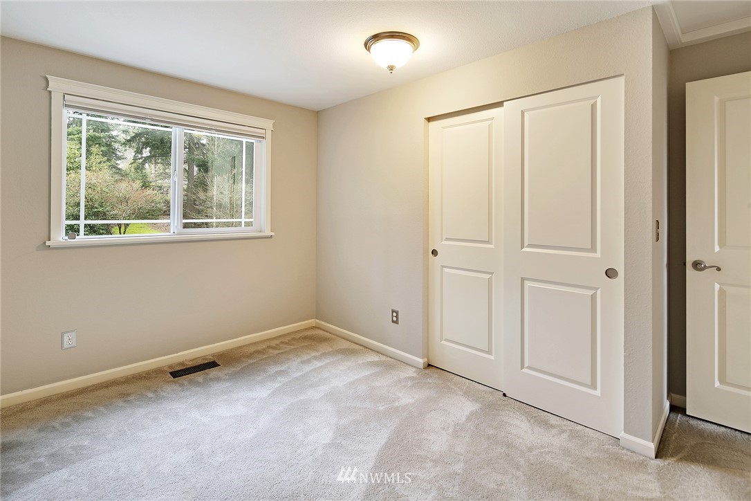 22415 1st Drive Southeast Bothell, WA 98021 - Photo 14 of 24 an empty room with windows
