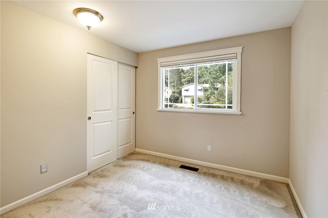 22415 1st Drive Southeast Bothell, WA 98021 - Photo 16 of 24 an empty room with windows
