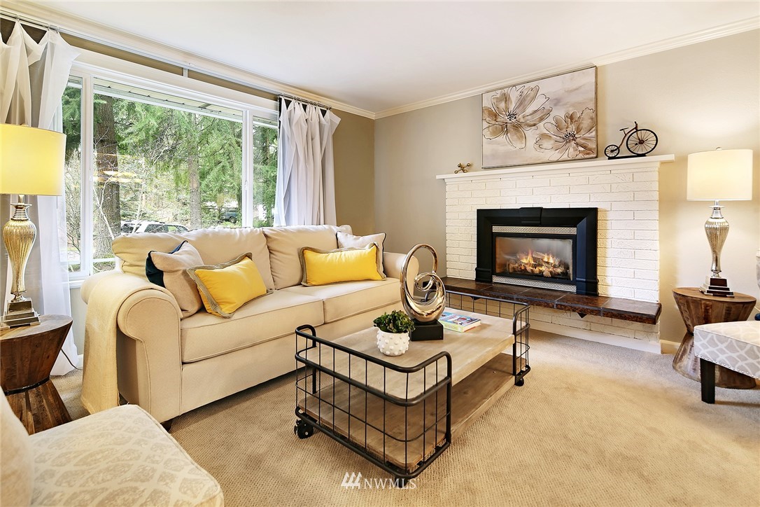 22415 1st Drive Southeast Bothell, WA 98021 - Photo 3 of 24 a living room with furniture and a fireplace