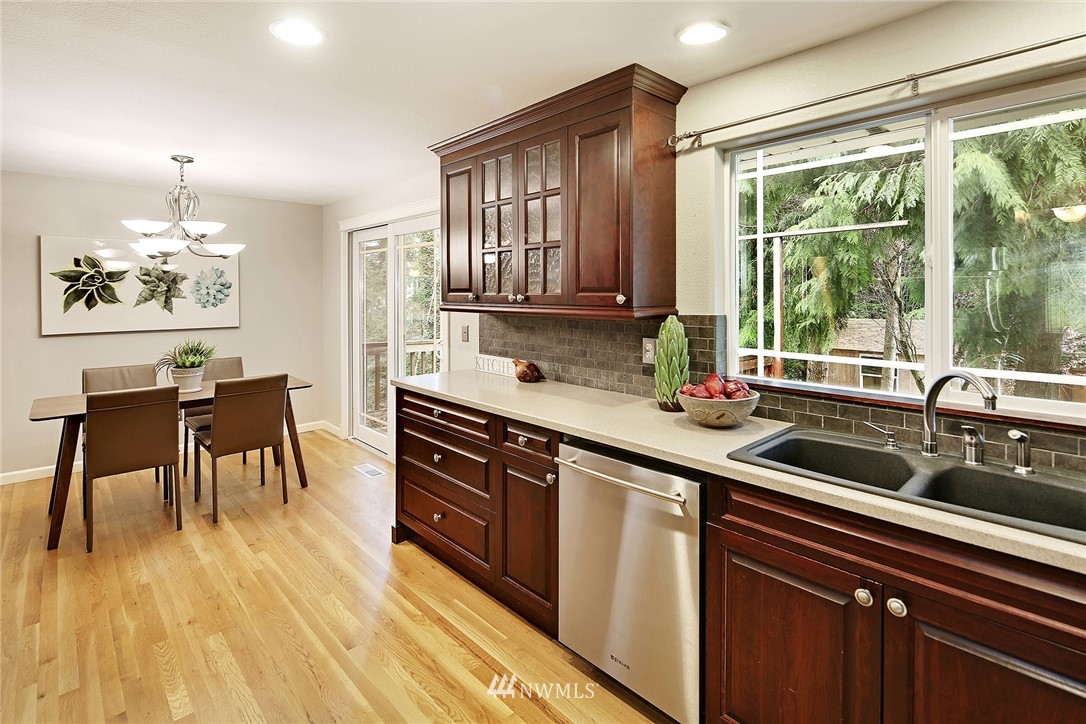 22415 1st Drive Southeast Bothell, WA 98021 - Photo 8 of 24 a kitchen with a sink a counter top space and appliances