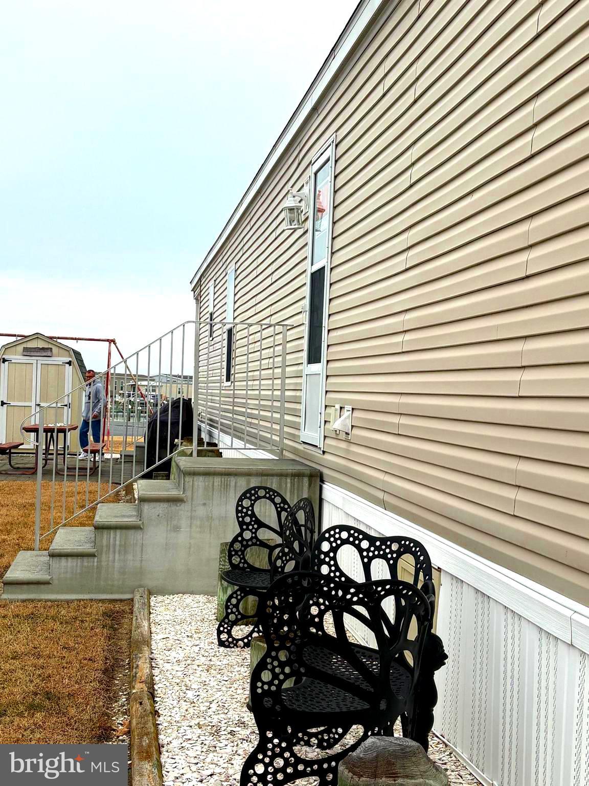 38025 Rabbit Road, Unit 101 Ocean View, DE 19970 - Photo 2 of 112 Front door and shed