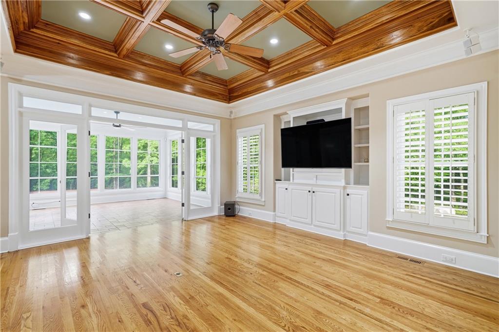 4185 Pool Road Winston, GA 30187 - Photo 16 of 39 a view of a livingroom with a flat screen tv wooden floor and window