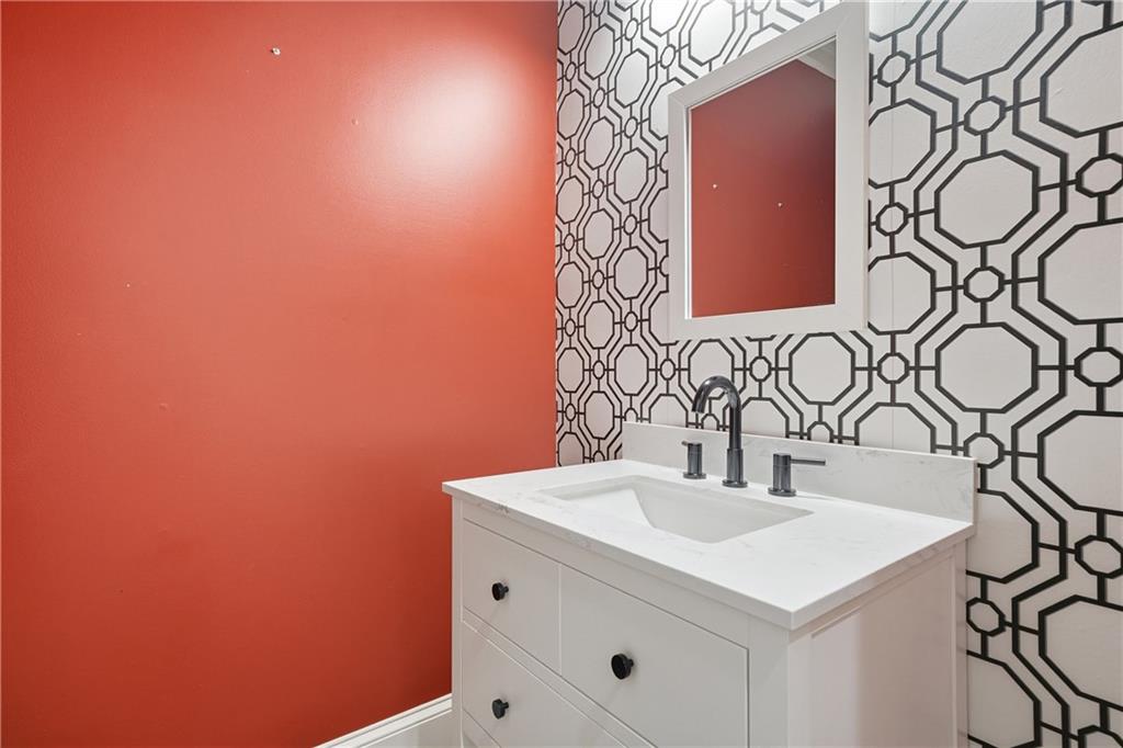 4185 Pool Road Winston, GA 30187 - Photo 24 of 39 a bathroom with a sink and a mirror