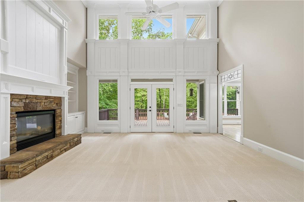 4185 Pool Road Winston, GA 30187 - Photo 9 of 39 a view of an empty room with a fireplace and a window