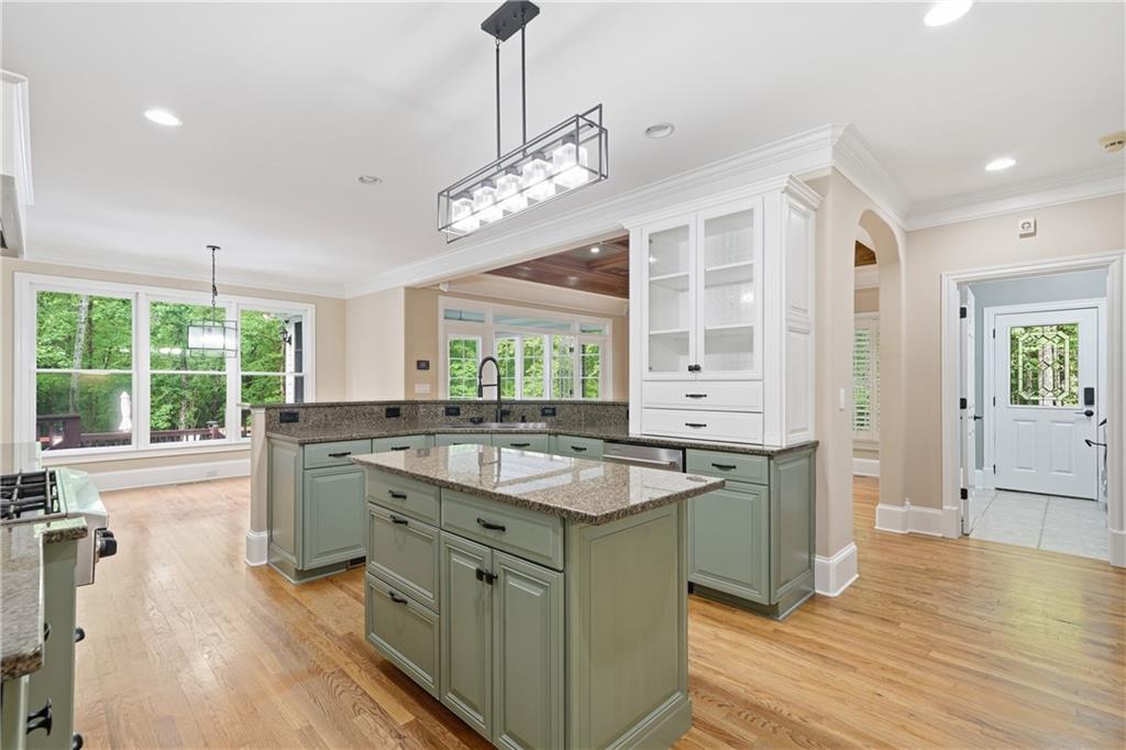 4185 Pool Road Winston, GA 30187 - Photo 10 of 39 a kitchen with a sink stove and wooden floor