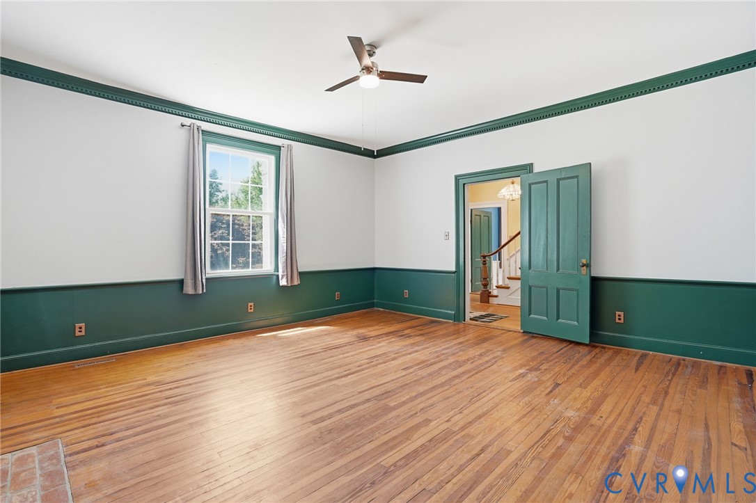 2297 Indian Oak Road Crewe, VA 23930 - Photo 11 of 53 wooden floor in an empty room with a window