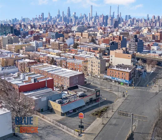 an aerial view of a city with lots of residential buildings