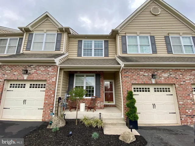 a view of a house with a porch