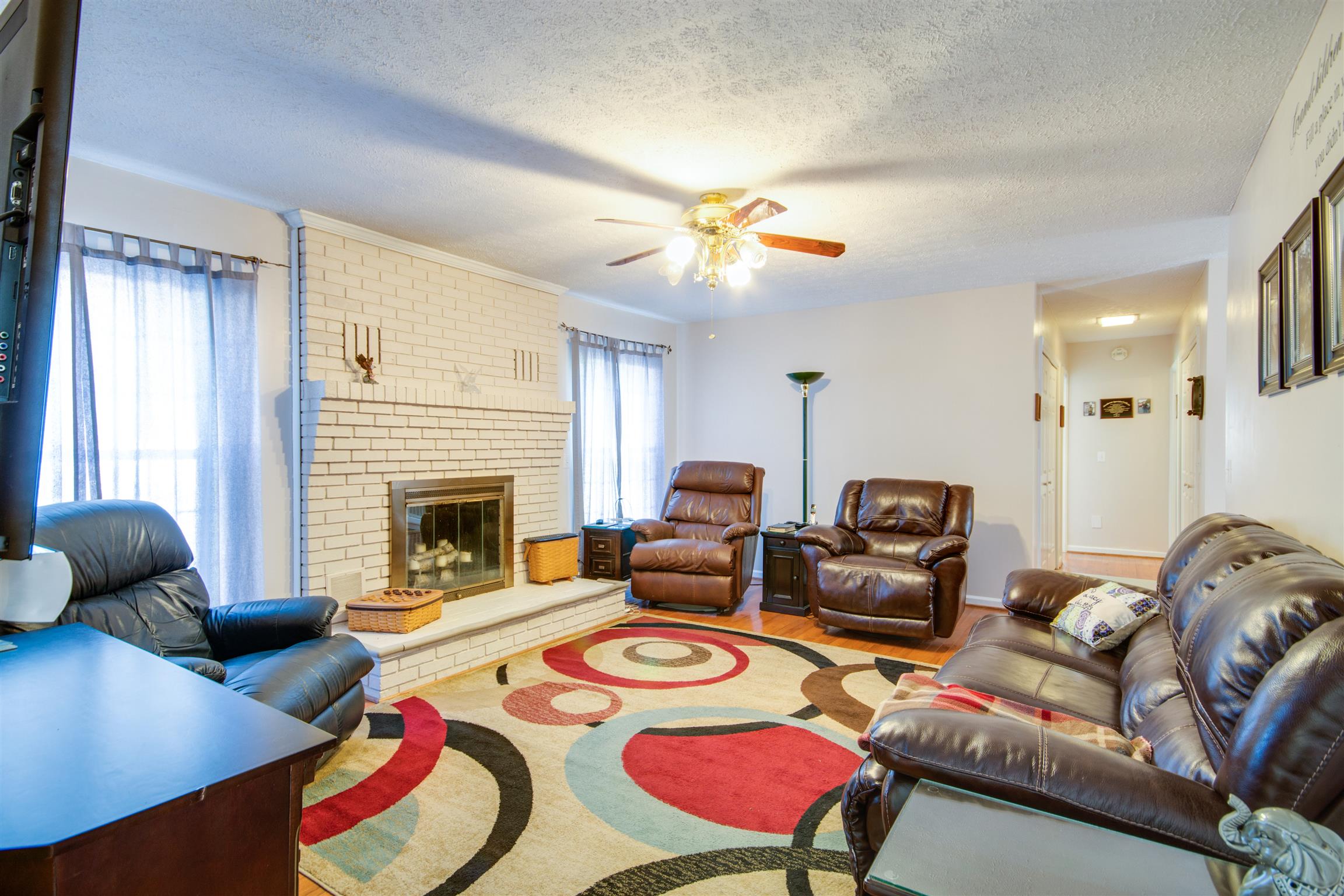 507 Mortons Lake Road Manchester, TN 37355 - Photo 6 of 22 Large den with fireplace and lots of natural light