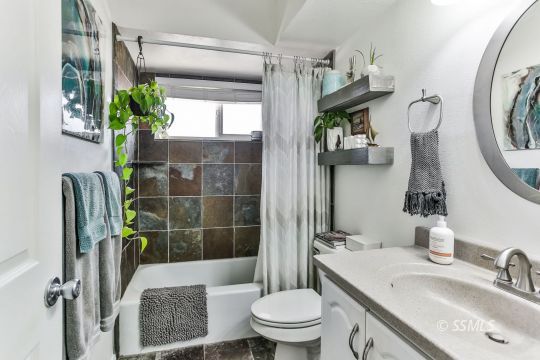 429 West Perdew Avenue Ridgecrest, CA 93555 - Photo 36 of 50 a bathroom with a sink a toilet and shower
