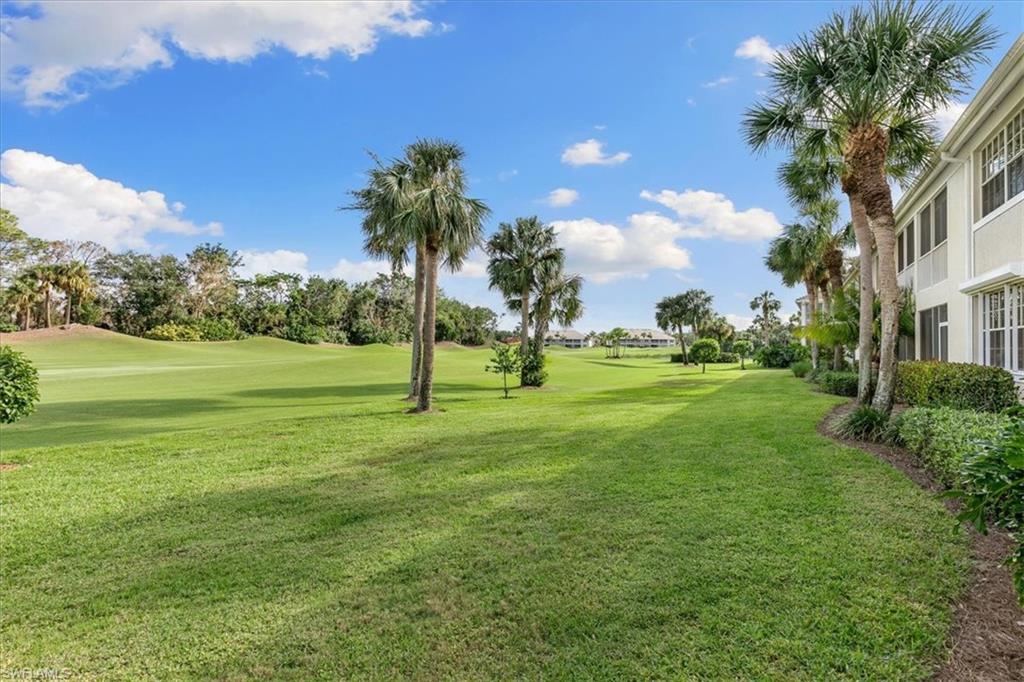 2090 Aberdeen Lane, Unit 101 Naples, FL 34109 - Photo 25 of 42 a view of a golf course
