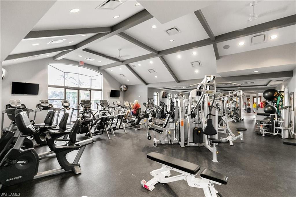 2090 Aberdeen Lane, Unit 101 Naples, FL 34109 - Photo 34 of 42 a view of a room with gym equipment
