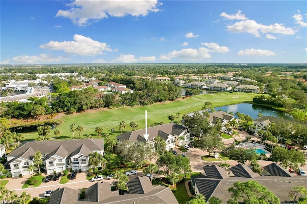 2090 Aberdeen Lane, Unit 101 Naples, FL 34109 - Photo 36 of 42 a view of a city with lots of residential buildings ocean and mountain view in back