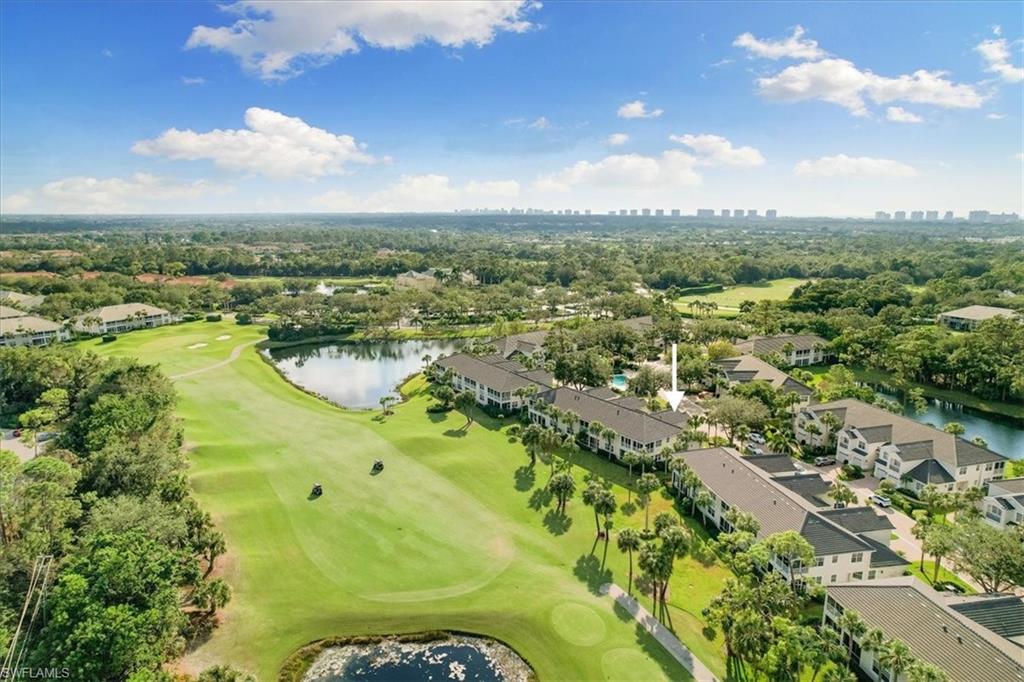 2090 Aberdeen Lane, Unit 101 Naples, FL 34109 - Photo 37 of 42 an aerial view of residential houses with outdoor space