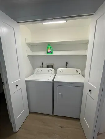 a utility room with a washer and dryer
