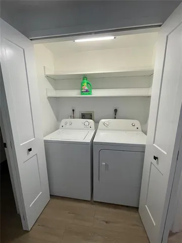 a utility room with a washer and dryer