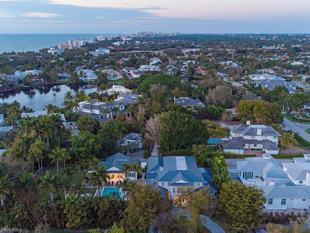 225 4th Avenue North Naples, FL 34102 - Photo 32 of 42 an aerial view of a city with lots of residential buildings