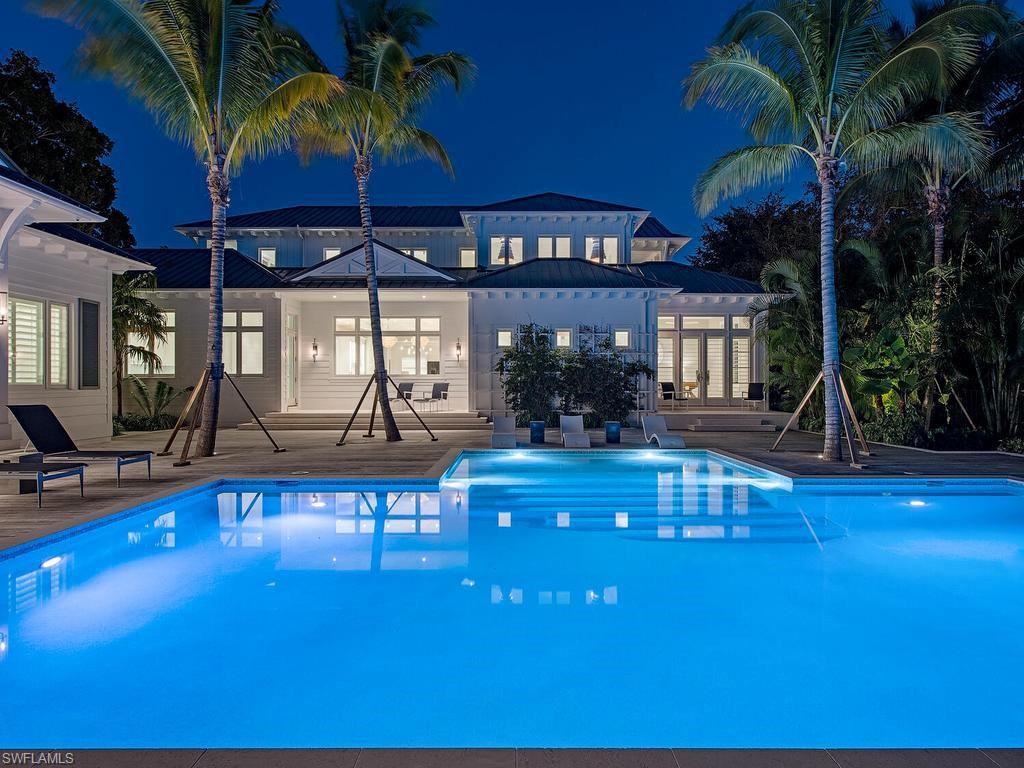 225 4th Avenue North Naples, FL 34102 - Photo 42 of 42 a view of swimming pool with outdoor seating