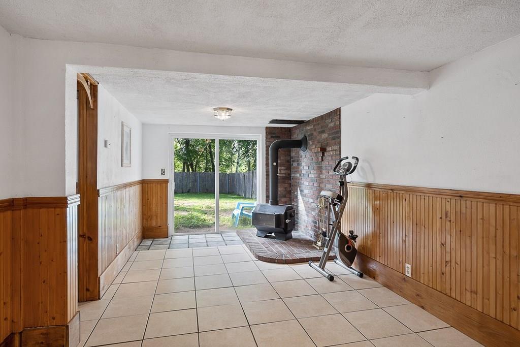 24 Springwell Road Billerica, MA 01821 - Photo 11 of 16 a living room with furniture