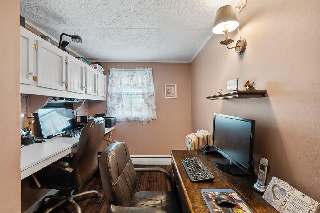 24 Springwell Road Billerica, MA 01821 - Photo 9 of 16 a workspace with furniture and wooden floor