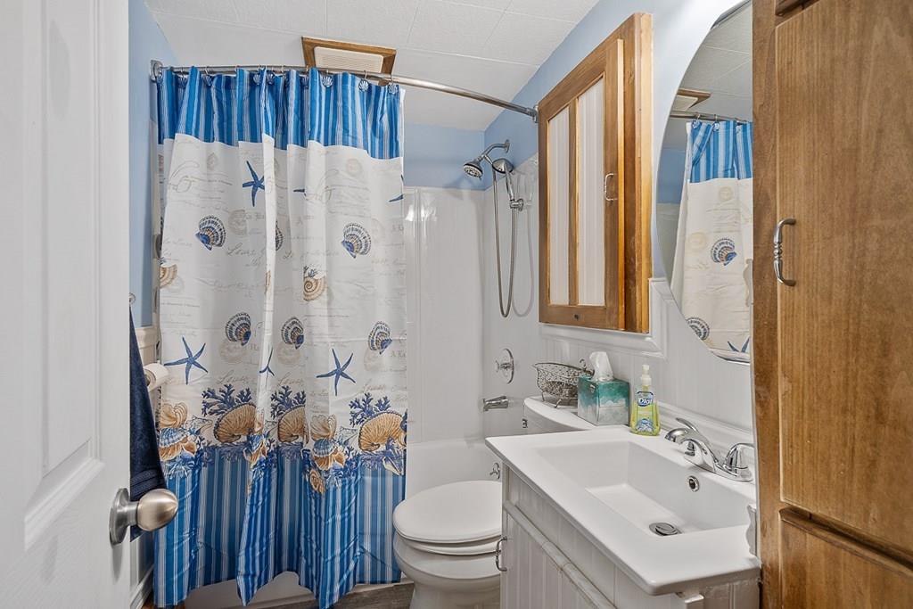 24 Springwell Road Billerica, MA 01821 - Photo 10 of 16 a bathroom with a sink toilet and shower