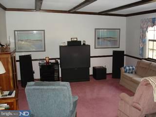 85 Euston Road South Marlton, NJ 08053 - Photo 5 of 6 a living room with furniture and a flat screen tv