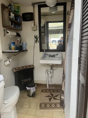 a view of wooden floor in a kitchen
