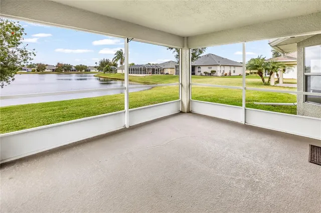 a view of a garden with an outdoor seating