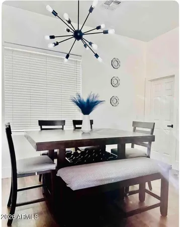 a view of a workspace with furniture