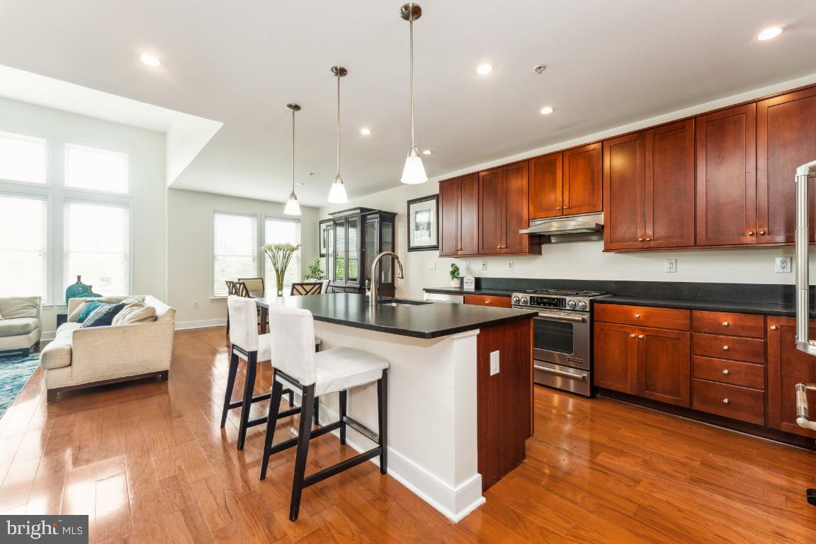 1418 North Rhodes Street, Unit B428 Arlington, VA 22209 - Photo 1 of 23 Open concept bathed in natural light.