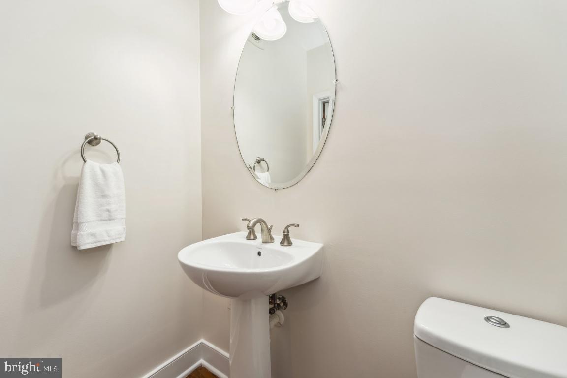 1418 North Rhodes Street, Unit B428 Arlington, VA 22209 - Photo 9 of 23 Powder room on main level.