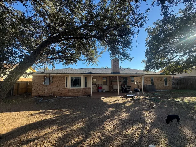 front view of a house with a patio