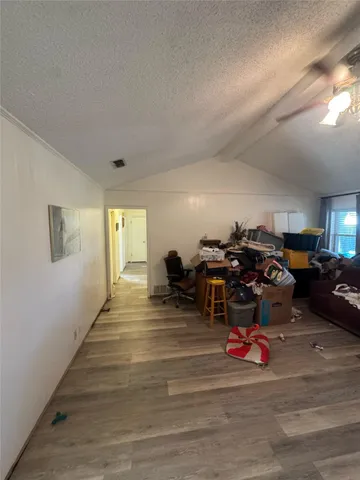 a view of a livingroom with furniture