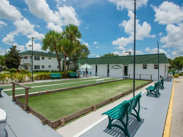 a view of swimming pool with chairs