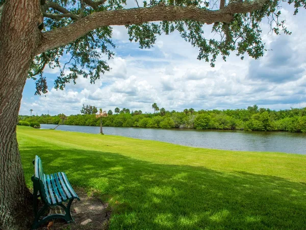 a view of a lake with a big yard