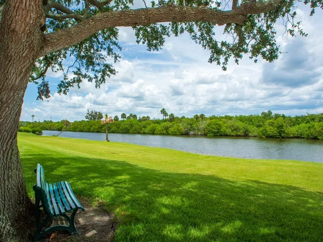 a view of a lake with a big yard