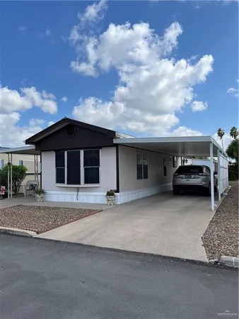 a house with trees in the background