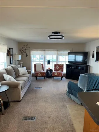 a living room with furniture and a couch