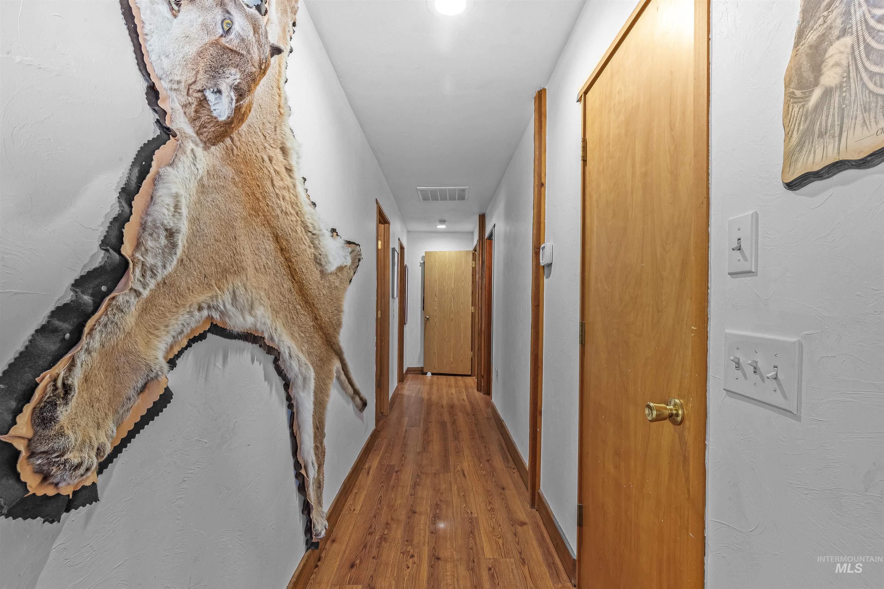 302 Berger Street Riggins, ID 83549 - Photo 9 of 47 Hall featuring wood finished floors