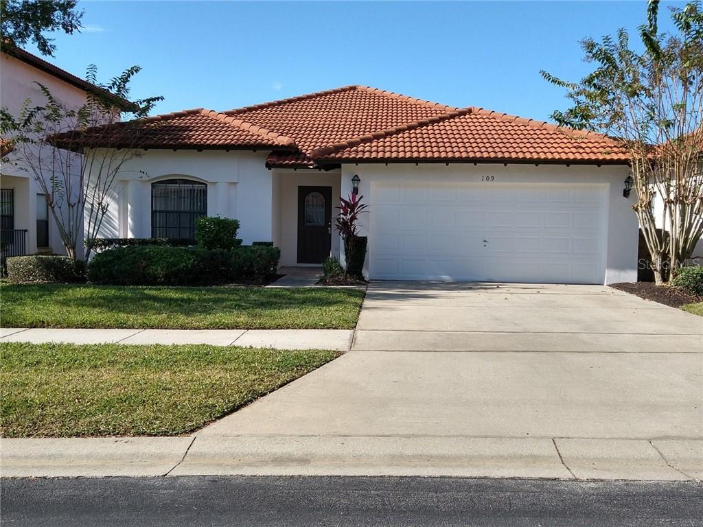 109 Sandy Point Way Clermont, FL 34714 - Photo 1 of 1 a front view of a house with a yard