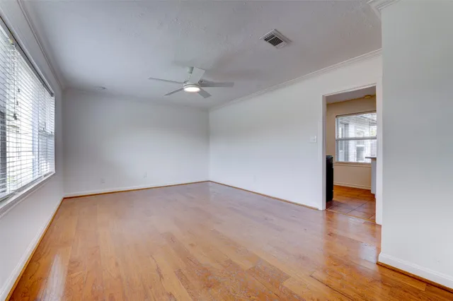 a picture of floor with a white wall and white wall